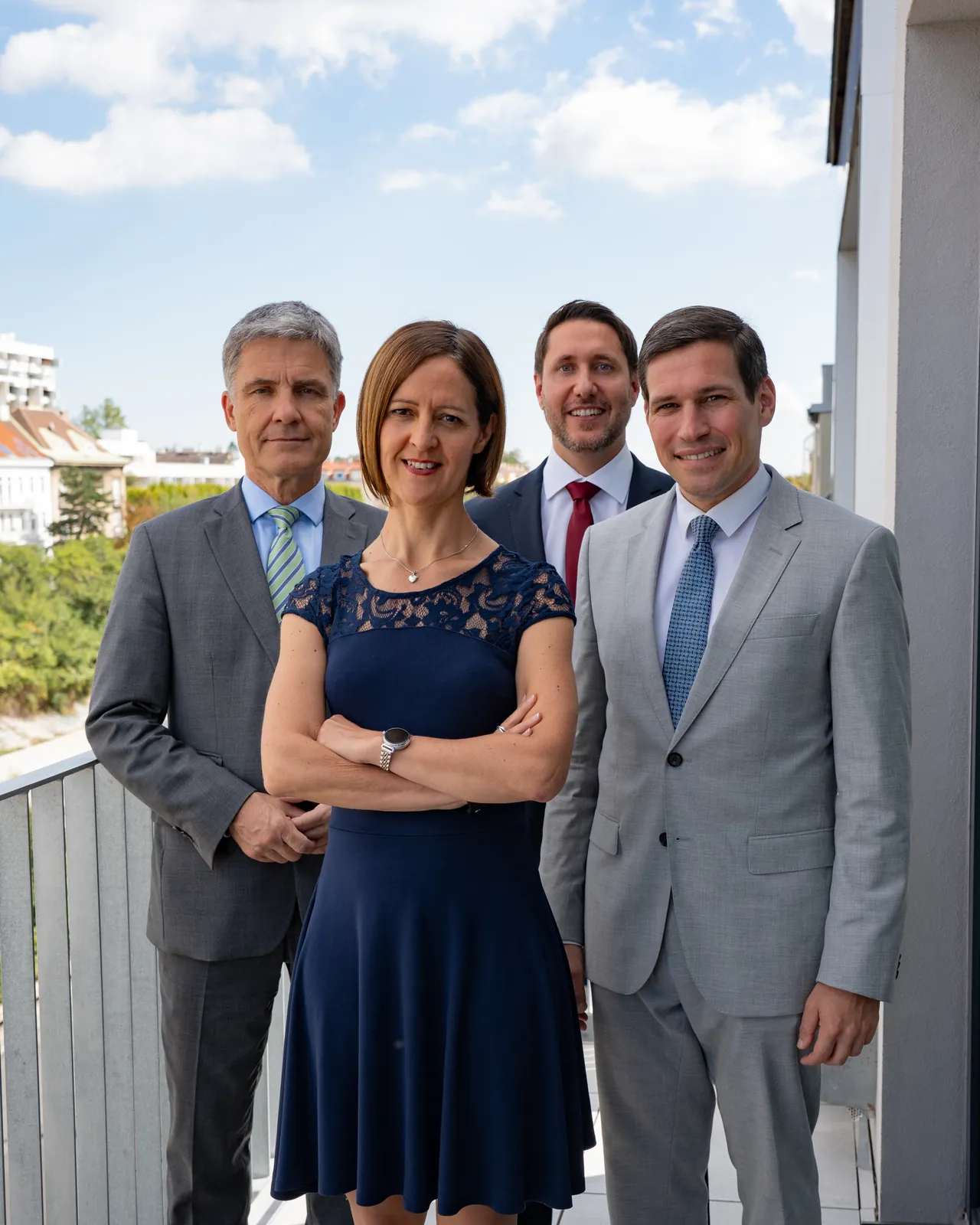 BECO's management team on the balcony